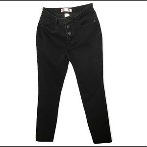 Black button fly stretch skinny jeans. Juniors 11.